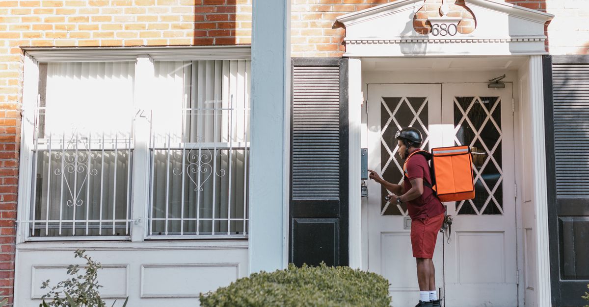 locksmith unlocking front door — Springfield Locksmith Corp